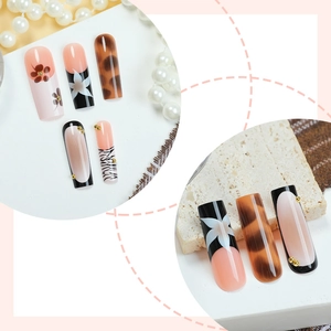 Handmade leopard print and champagne cat eye coffin fake nails with floral patterns