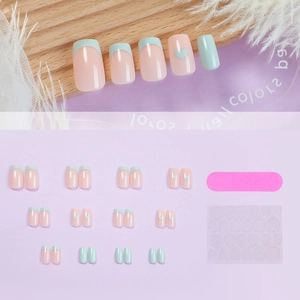 Handmade cat-eye press-on nails set with mint green French tips and heart accents