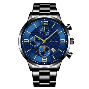 Detail of blue sunray dial chronograph watch with luminous hands and steel strap