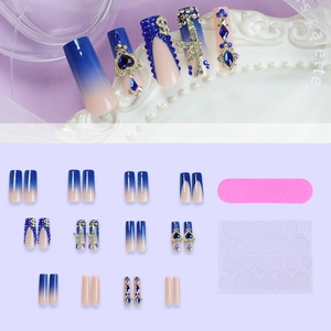 Blue gradient press-on nails set with rhinestones and heart charms in 24 pieces