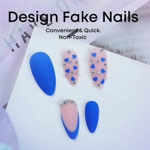 Blue heart press on nails in almond shape with rhinestones and matte finish design