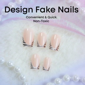 Short square press-on nails with French animal print tips on white faux fur background