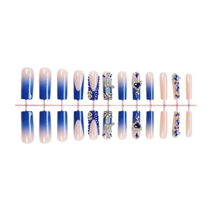 French royal blue gradient press-on nails with heart rhinestones and silver accents