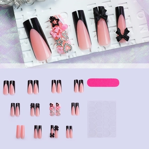 Pink French coffin press-on nails set with 3D black bows and sparkling stars
