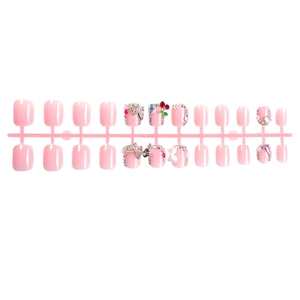 Pink press-on nail set with 3D cherry, bow, and rhinestone accents on short square shapes