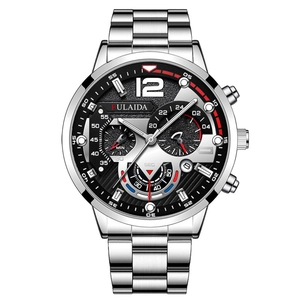 Close-up of men's multifunction watch with carbon fiber dial and silver steel band
