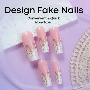 Pink and white French press-on nails with golden bows in long coffin shape