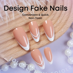 Almond-shaped press-on nails with nude pink base and white French tips and line art