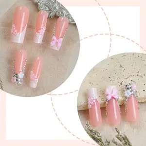 Long ballerina press-on nails with 3D floral accents and rhinestones in soft pink finish