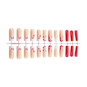 Press-on nail set featuring red hearts and XO patterns in long coffin square shape