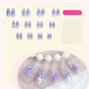Purple gradient press-on nails set with 3D flowers, pearls, and butterfly charms