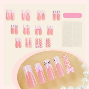 Pink long trapezoid press-on nails with 3D bows and cute cat art set with tools
