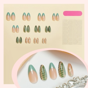 Elegant almond press-on nails with blue French tips, snake skin pattern and gold star accents