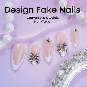 French tip almond press-on nails with silver bows and pearls on a pink base