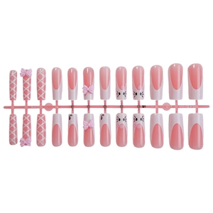 Pink and white extra-long press-on nails with 3D bows and cute cat face patterns