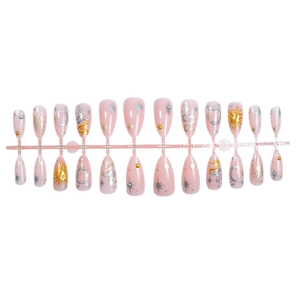 Faux ongles amande avec motifs célestes 3D dorés et argentés sur base rose