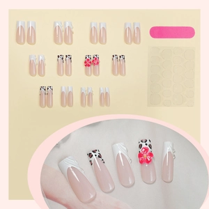 French leopard print press-on nail set with 3D floral accents and styling tools