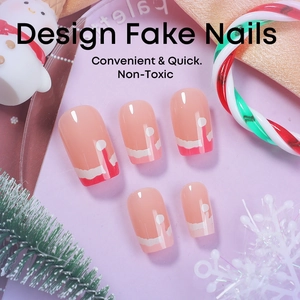 Christmas press-on nails with red and white French wave patterns and holiday decor
