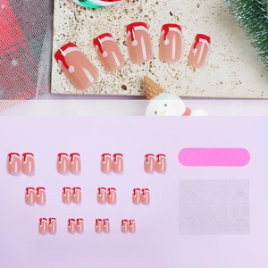 Kit de 24 faux ongles courts style Noël avec motifs de bonnets rouges et adhésifs