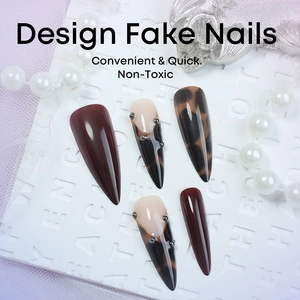 Non-toxic leopard print stiletto press-on nails with red polish and silver beads