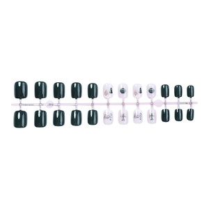 Short square press-on nails in dark green and white with festive Christmas tree patterns