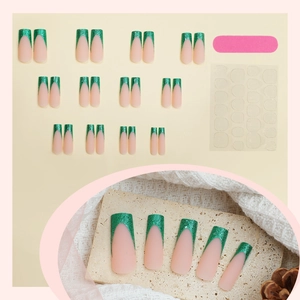 French tip press-on nails in long coffin shape with green glitter and nude matte finish