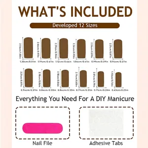 Blue Christmas press-on nails set with size chart, nail file and adhesive tabs