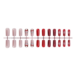 Faux ongles de Noël rouge à paillettes avec motifs flocons de neige et design de fête