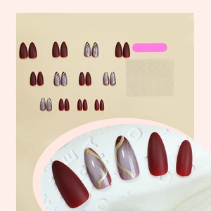 Matte burgundy and gold marble almond press-on nail kit with files and adhesive