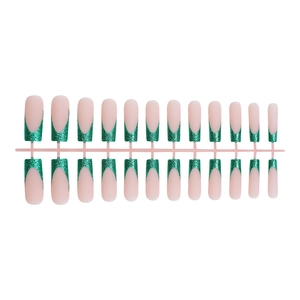 Green glitter French tip press-on nails in long square shape on a 24-piece display set