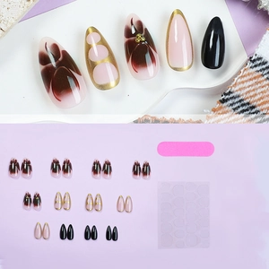 Almond press-on nails with red black floral patterns, gold edges and 24-piece kit