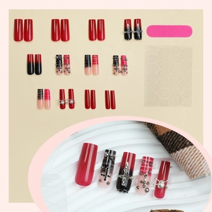 Gothic punk press-on nails with dark red gradient, metal crosses and skull charms set