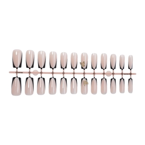 French tip press-on nails in black and nude with golden butterfly 3D accents