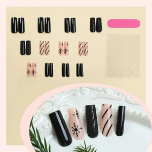 Winter Christmas press-on nails with black sweater texture and snowflake designs