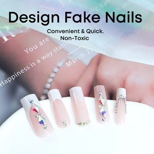 Luxurious French gradient press-on nails with colorful rhinestones and 3D gems