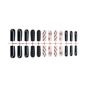 Christmas false nails with black sweater texture and snowflake patterns long coffin shape