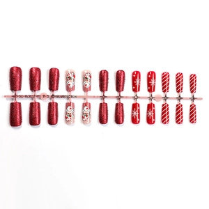 Christmas press-on nails set with festive red glitter, Santa Claus and snowflake designs