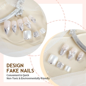 Silver press-on nail set with crystal butterfly 3D accents and glitter French tips