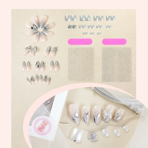 Sparkling French press-on nail set for hands and feet with 3D butterfly and rhinestone accents