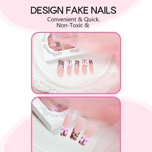 Long coffin fake nails with leopard French tips and pink 3D ribbon bow accessories