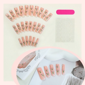 Press-on nail set with nude pink cherry rhinestone design and application tools