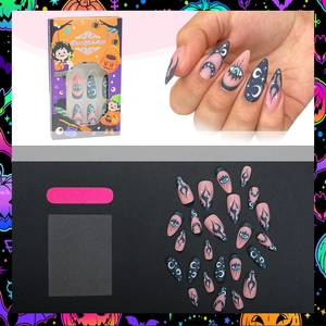 Halloween almond fake nails with black French flame and moon designs including tools