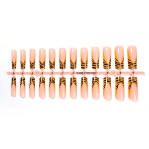 Long coffin press on nails featuring black leopard print and tiger pattern tips