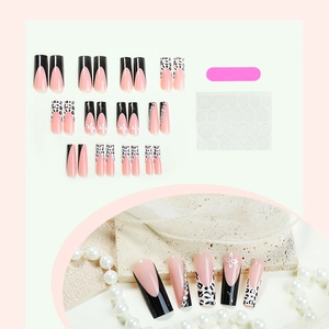 Long coffin fake nails set featuring pink leopard print, flowers, and rhinestones with tools