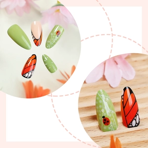 Almond press-on nails with butterfly wings, ladybug art, and 3D dewdrop leaf patterns