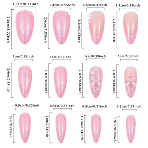 Tabella taglie per unghie finte mandorla rosa glitterate con perle e French