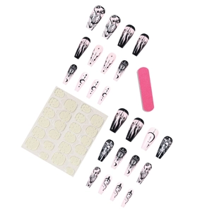 Gothic press-on nails set featuring black and pink star moon patterns with nail file