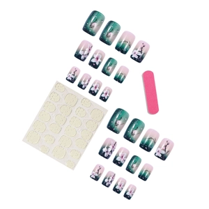Dark green gradient press-on nails with floral cherry blossom designs and application kit