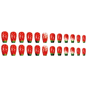 Strawberry style press-on nails with red base, white dots and green leaf details