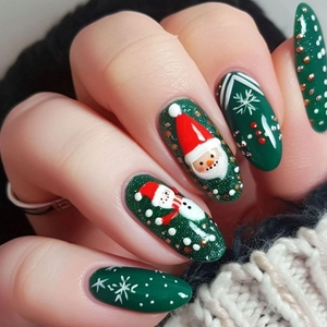 Christmas almond false nails with 3D Santa and snowman designs in dark green finish